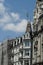 Facades  of historical residential buildings in Zurich city center, some of them in reconstruction, covered by protective net