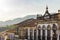 Facades of houses in colonial architecture in an old street in the city of Ouro Preto