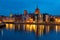 facades of old medieval houses on the embankment in Gdansk on the banks of the river MotÅ‚awa. Gdansk, Poland