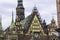 Facades, roofs , sculptures,stone decoration and towers of the medieval Town Hall.