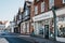 Facades of a row of shops, banks and pubs in Sheringham, Norfolk, UK