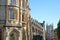 Facades on Trumpington Street with the Corpus Clock designed by John Taylor in the foreground and the Pitt Building in the backg