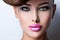 Face of beautiful woman with fashion vivid color makeup