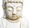 Face of Buddha statue white isolated on white background. Founder of Buddhism. Black and white photo, close up