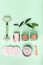 Face care tools and accessories.Green spa. massager, facial oil, handmade soap,face cream, mask. flat lay composition.Natural
