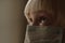 Face of child in medical mask close up. Boy wears surgical mask protection against flu