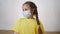 Face child protective mask portrait on a white background. Stay home coronavirus quarantine kid dream concept. Little