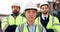 Face, construction worker and maintenance team with engineering and contractor, people outdoor with confidence