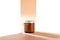 face cream in dark glass jar with metal lid on beige background with hard shadows. Trendy catalogue image. Professional