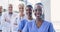 Face of doctors, team and smile for healthcare services, hospital support and trust. Portrait of black woman, nurses and