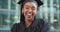 Face, funny and black woman with graduation, education or celebration with happiness, robe or university. Portrait