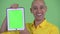 Face of happy handsome bald businessman showing digital tablet