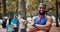 Face, happy man and confidence of runner at park for marathon, exercise or fitness in South Africa. Portrait, arms