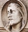 Face of Jesus Christ close up fragment of antique statue