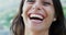 Face, laughing and happy woman outdoor on holiday in nature, vacation or summer travel in Europe. Portrait, funny and