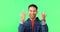 Face of a male with a rocker gesture by green screen listening heavy metal music, playlist or album. Happy, portrait and