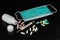 Face mask, mercury thermometer and different pills with bottle o