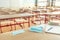 Face mask on a teachers and school desk in a school classroom