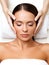 Face Massage. Close-up of a Young Woman Getting Spa Treatment.