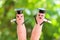 Face painted on the fingers. students holding their diploma after graduation