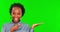 Face, palm space and black woman on green screen in studio isolated on a background. Portrait, pointing to mockup hand