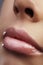 Face part. Beautiful female lips with natural makeup, clean skin. Macro shot of female lip, clean skin. Fresh kiss. Spa beauty cos