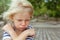 Face portrait of annoyed, unhappy caucasian kid with crossed arms