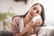 Face relief expression of a young woman holding ice bag on her cheek