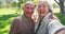 Face, senior and selfie of happy couple at park for love, support and bonding together. Portrait, profile picture and