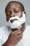 Face Shaving. Skincare Beauty Concept. Man Removes Facial Hair. Using Of Razor Shaver For Beard.