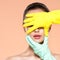 Face skin check before plastic surgery. Beautician touching young woman face. Doctor in medicine gloves checks a skin before