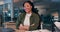 Face, smile and business woman with arms crossed at desk in work office at night in startup. Portrait, confidence and