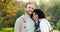 Face, smile and interracial couple in nature, bonding and having fun together. Portrait, love and happy man and African