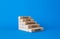 Face the things you fear symbol. Wooden blocks with words Face the things you fear. Beautiful blue background. Business and Face