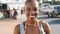 Face, travel or happy black woman with smile in New York city, street or road for freedom, vacation or holiday. Portrait
