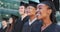 Face, university or happy graduates in ceremony or gowns standing in a line outside on campus. Diversity, degree or