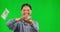 Face, woman and throw cash on green screen for winning, business wealth, success and financial freedom. Excited asian