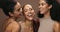 Face, women and group with skincare, cosmetics and laughing on a brown studio background. Models, friends and girls with