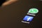 Facebook icon on mobile phone screen