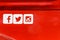 Facebook, Twitter and Instagram Social Media Icons on Red Metal Background