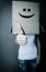 Faceless girl with box on her head LIKE with thumb up, social ne
