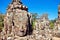 Faces of ancient Bayon Temple At Angkor Wat