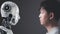 The faces of human and a robot on opposite sides Looking at each other, Modern AI technology concept, humans and robots,