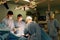faces of surgeons in the operating room during the operation. Modern medicine, medical workers during a complex