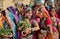 Faces of young indian women in colorful dresses at traditional Desert Festival