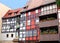 Fachwerk houses with flowerpots at the Merchants bridge, Erfurt, Germany