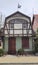 Fachwerk style house. Weather vane on the roof. Zelenogradsk.