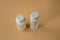 Facial and body care cosmetics bottles composition on brown background. Gel tube  lipstick  cream jar unbranded blank packages.