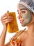 Facial honey clay face mask woman . Honeycombs homemade organic threatment.