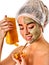 Facial honey clay face mask woman . Honeycombs homemade organic threatment.